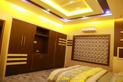 a bedroom with a bed and a ceiling at 3 BHK HOUSE with nice facilities,Gate&Fence in Kunnamangalam