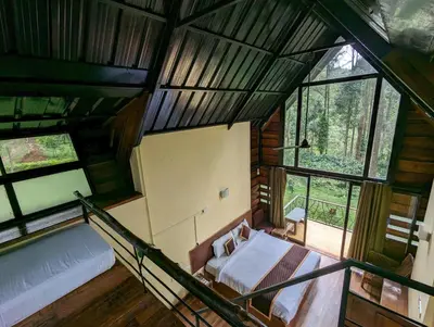 an overhead view of a bedroom in a tree house at Gorukana Eco Wellness Centre in Honganūr