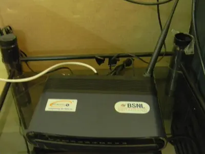 a laptop computer sitting on top of a table at Gerones Residency Serviced Apartments & Home Stays in Coimbatore