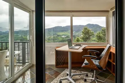 an office with a desk and a laptop on a table at Shangrila Casa-Premium Homestay in Wellington Town