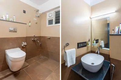 two pictures of a bathroom with a toilet and a sink at Treebo Sanmaya Retreat, 15 Mins From Mysore Palace in Mysore