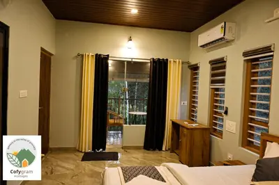 a living room with a large window with yellow curtains at Cofygram cottages in Wayanad