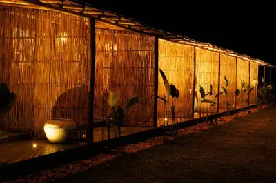 a building with birds painted on the side of it at Jungle Park Resort-Rain Forest Experience by GreenEscapes in Vythiri
