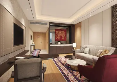 a living room with a couch and a table at Taj Cochin International Airport, Kerala in Cochin