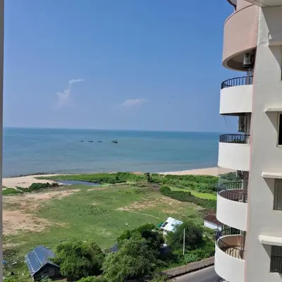 a view of the ocean from a building at Seashells Pentagon Calicutbeach in Kozhikode