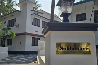 a building with a sign that says sophamma on it at Entire 4 Bedroom Villa in Kannur in Edakkād
