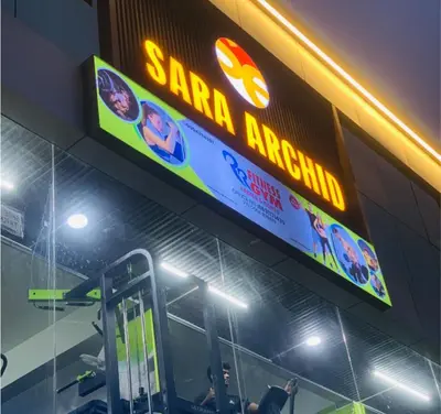 a sign on the side of a bus at Sara Archid in Kommeri