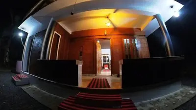 a view of a hallway of a building at Homestay Rooms Muzhakkunnu Near Kannur International Airport in Iritti