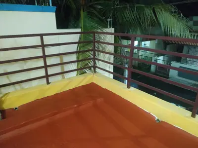 a view from the top of the balcony of a house at Mithu's Nest-Ur Holiday Abode in Coimbatore