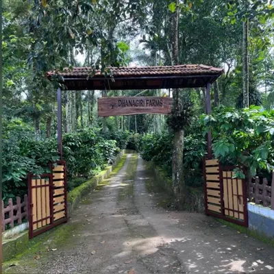 a gate with a sign that reads private farms at Dhanagiri Homestay Wayanad in Vythiri
