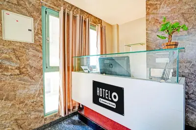 an office with a desk and a window at Super Hotel O Kaveri Road Mysore in Mysore