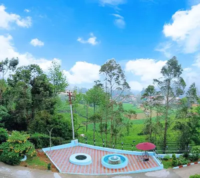 a view of a house with a swimming pool at The Monarch in Ooty