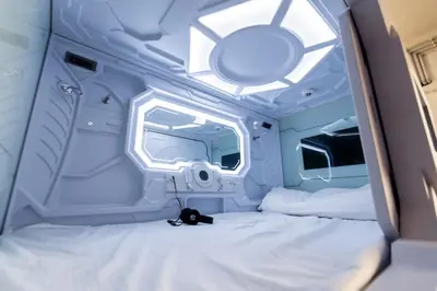 an inside view of a room with a bed at Bharath Pods in Coimbatore