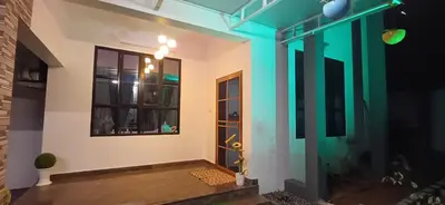 a room with a door and a window at Airport villa in Chewarra
