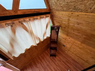 an overhead view of a room with a window at Fairyland Resort in Kodaikānāl