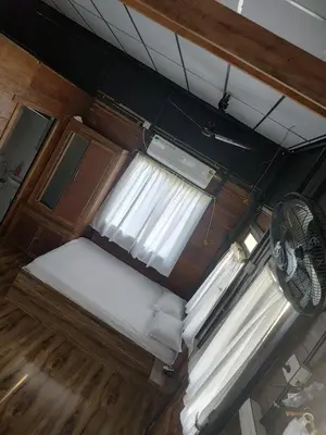 an overhead view of a room with a window at Katadi beach home in Thanniyam