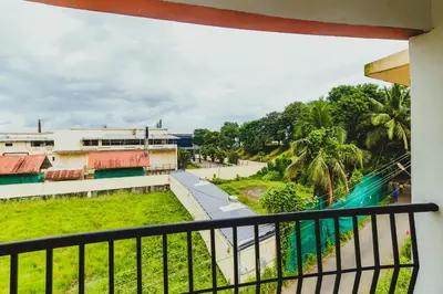 a view from the balcony of a building at Classic Cochin Airport Hotel in Nedumbassery