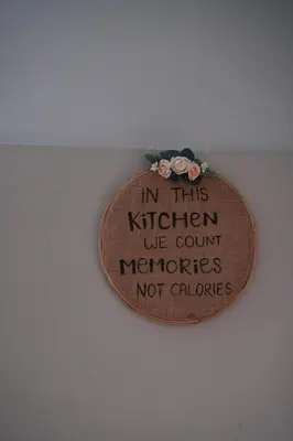 a sign that says in this kitchen we count memories not onions at Nutmeg Haven Plantation stay in Chewarra