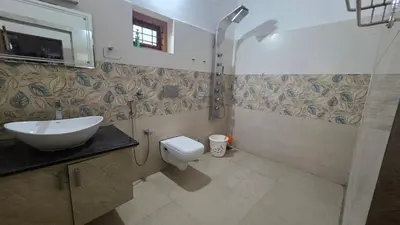 a bathroom with a sink and a toilet at Serahs Homestay in Agali