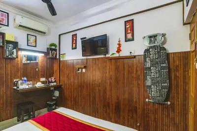 a surfboard hanging on the wall of a restaurant at Blue Bell Hotel in Nedumbassery