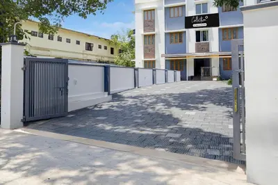 a gate in front of a building at Super Collection O Westhill Near Govt Engg College in Calicut