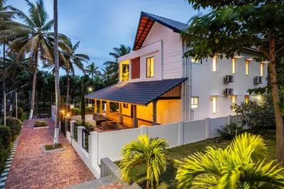 a house with a solarium on the side of it at Senaro Luxury Farm in Agali