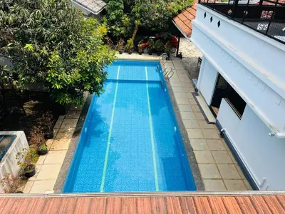 an overhead view of a swimming pool on top of a building at 2 Empire One Bedroom with Common Pool in Wayanad