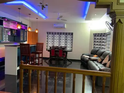a living room with a couch and a bar at 