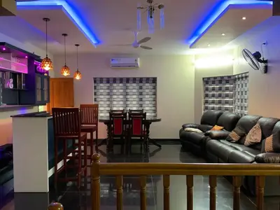 a living room with a couch and a table at 