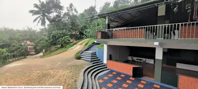 arial view of a building with a balcony at Stone Villa in Blooms Green Farm in Wayanad