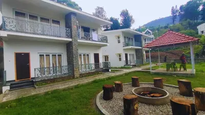 a house with a yard in front of it at Banana Tree Retreat in Kodaikānāl