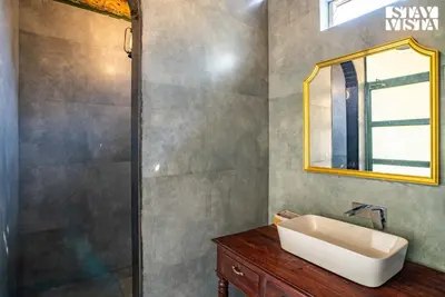 a bathroom with a sink and a shower at StayVista at Under the Stars Lovedale ooty in Ooty