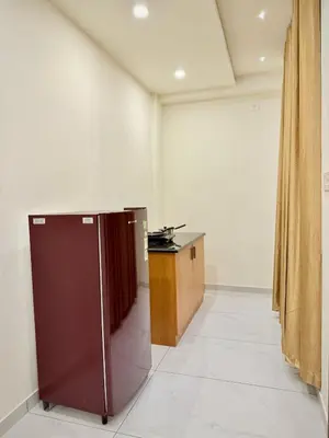 a room with a desk and a podium in it at Stay Bridge Residency in Kozhikode