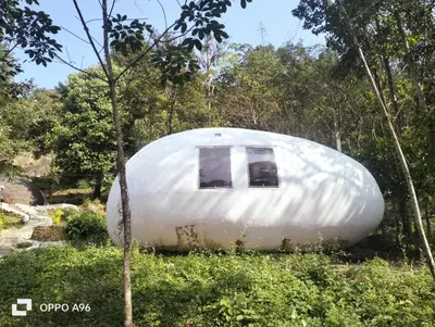 a round house in the middle of a forest at Mamalakandam - Egg House - in Diya Homestay in Mamalakandam