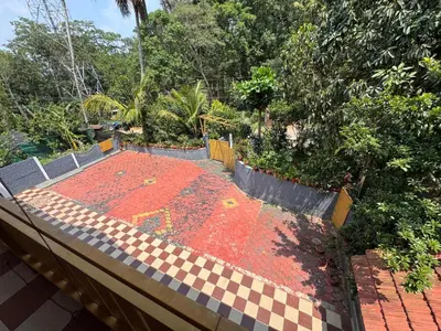a rangoli on the steps of a house at Sukhavana home stay suite in Madikeri