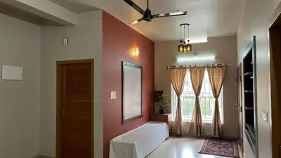 a living room with a door and a window at Vintage Coffee Premium Villa in Pinangode