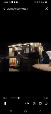 a picture of a building with a night view at La casona in Kottayam