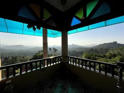 a view from the balcony of a house at Room Marakkech Mazha at Samava Farms Calicut in Kozhikode
