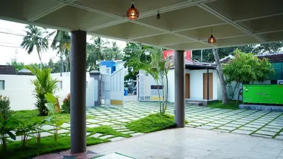an empty courtyard with a pavilion in a house at Hotel Vintage Palace in Tattamangalam