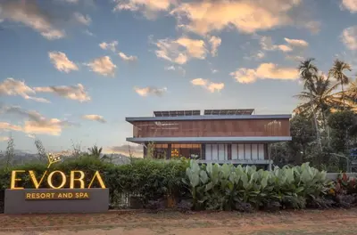 a building with a sign that reads evora resort and spa at EVORA Resort and SPA in Ambalavayal