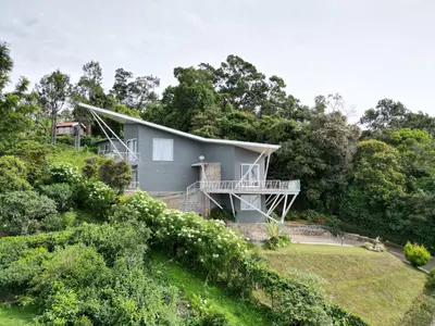 a house on the side of a hill at Ibex Resorts, Coonoor - Tapas in Yedapalli