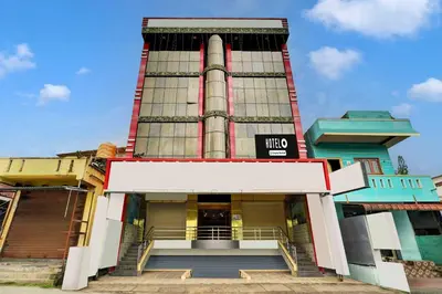 a building with a space shuttle on it at Hotel O Kushal Nagar Near KSRTC Bus Stand in Kushālnagar