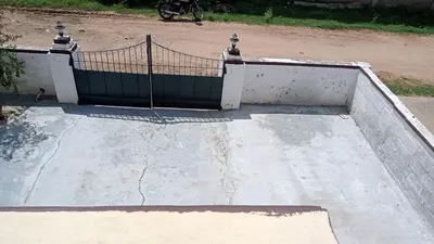 a ramp with a fence on top of it at GSC Family Holiday Home in Pollāchi