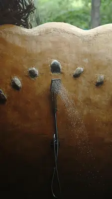 a close up of a beater on a piece of wood at The Misty Mudhouse in Marayoor