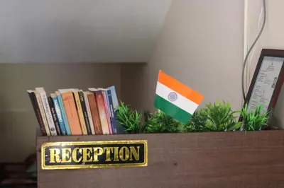 a flag on top of a box with books at bohom STAYORA in Nedumbassery