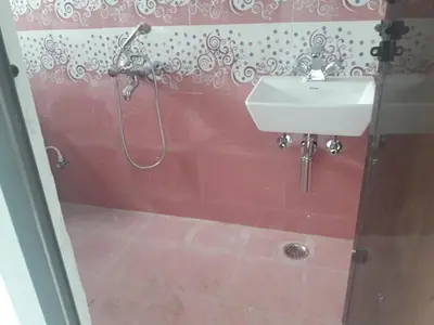 a bathroom with a sink and a shower at Zirku Garden Kodaikanal in Kodaikānāl