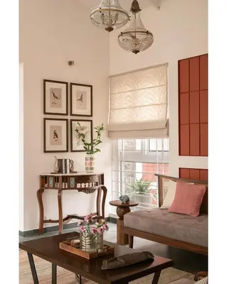 a living room with a couch and a table at Hillside Home 3 BHK Villa by tisyastays in Yedapalli