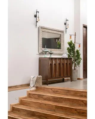 a church with a mirror on the wall and stairs at Hillside Home 3 BHK Villa by tisyastays in Yedapalli