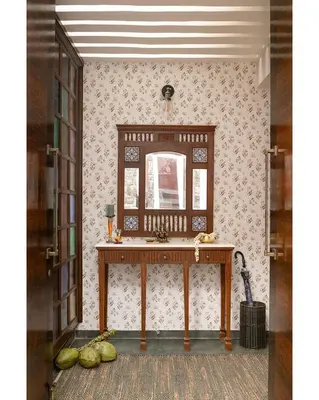 a bathroom with a sink and a mirror on a wall at Hillside Home 3 BHK Villa by tisyastays in Yedapalli