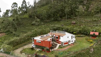 a model of a house on a hill at Hillside Home 3 BHK Villa by tisyastays in Yedapalli